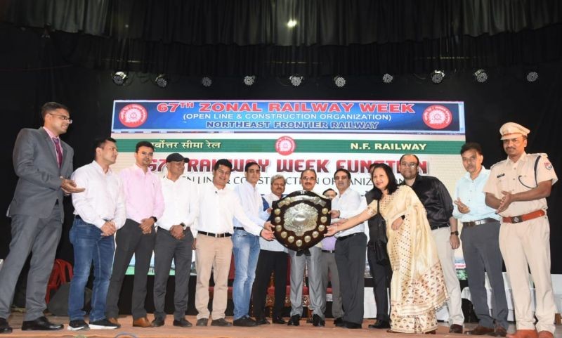 NFR General Manager, Anshul Gupta presents the Overall Efficiency Shield to Divisional Railway Manager JS Lakra (5th from right) of Lumding division.
